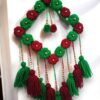Handcrafted Round Floral Wall Hanging with Tassels – Red & Green Festive Home Décor